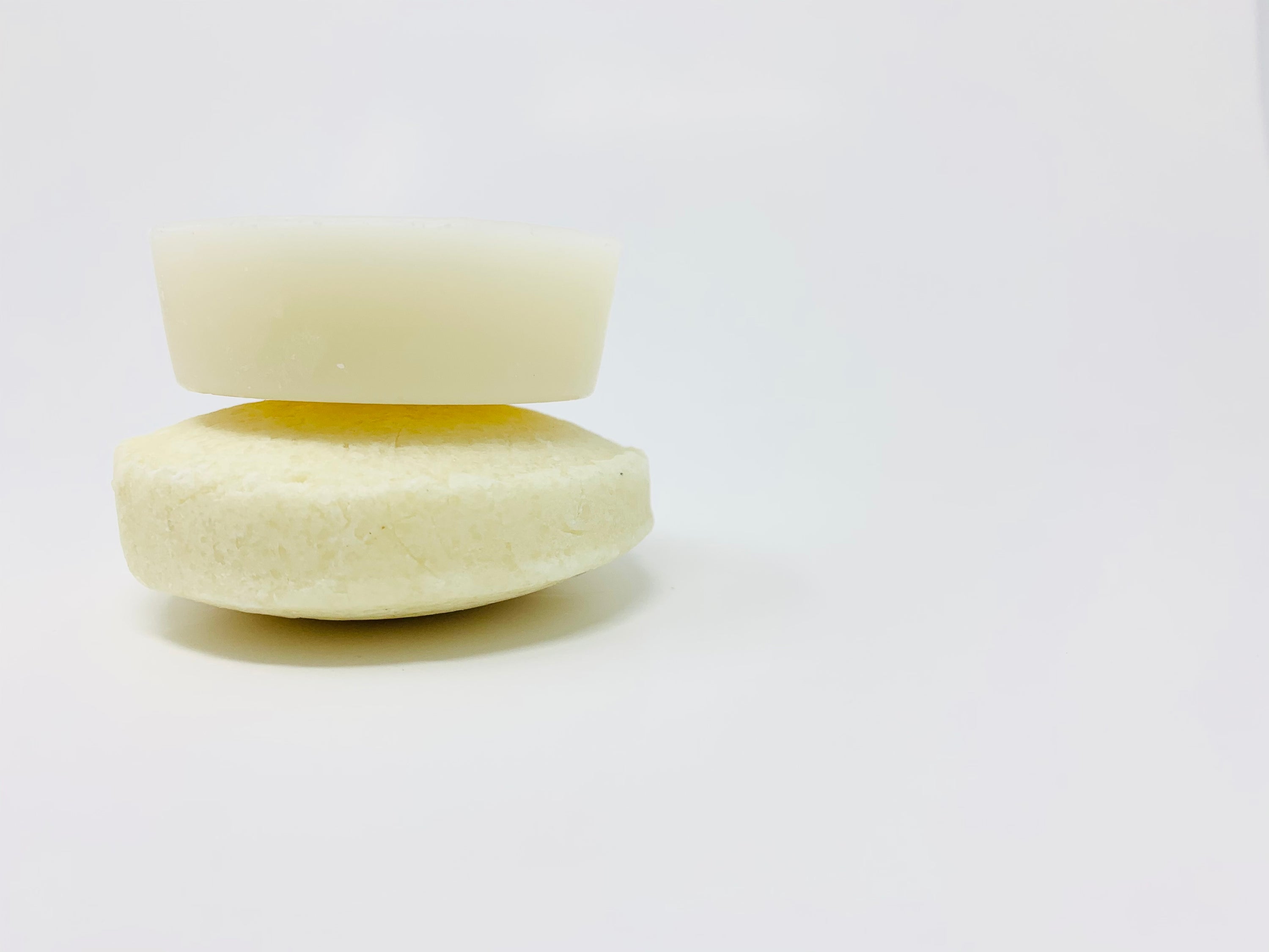 beYOU Bundles featuring eco-friendly shampoo and conditioner bars in low waste packaging, showcasing various sizes and a travel case.